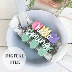 May include: A digital file for a craft project featuring a design of four colorful tulips with the text "hello spring" in white lettering.