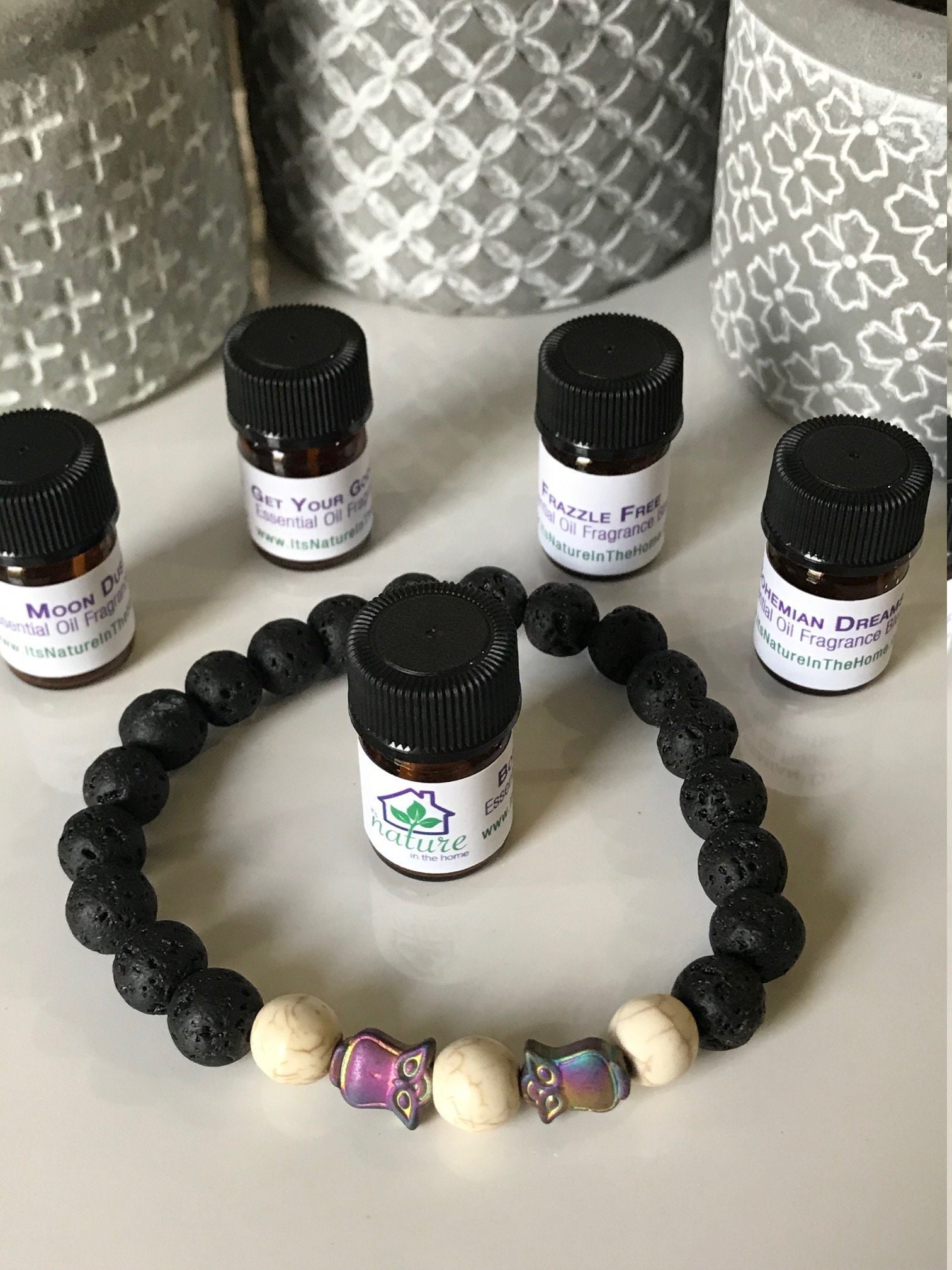 Lava Stone Diffuser Bracelet: Hematite Owl, Howlite, Essential Oil Blend