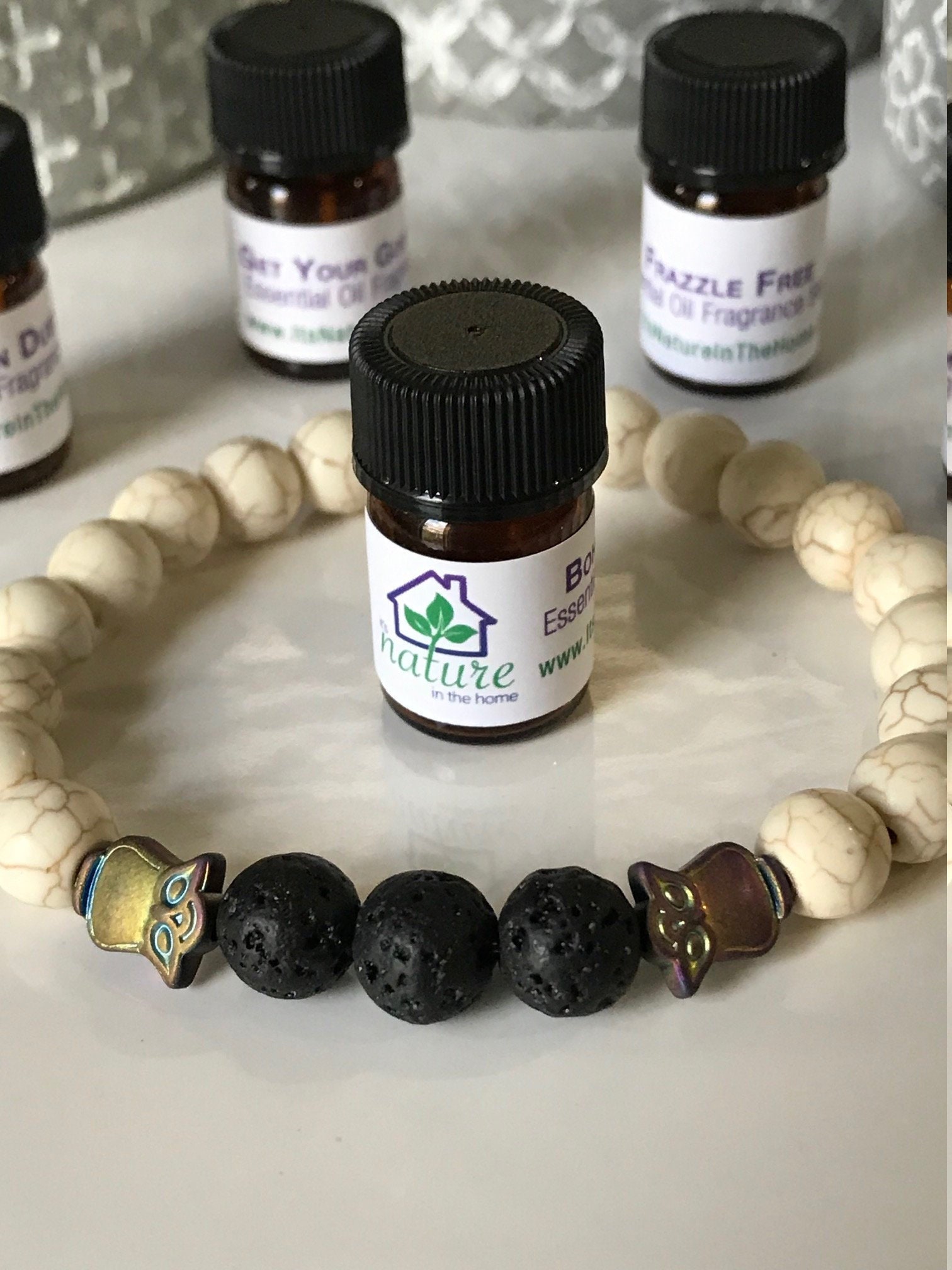 Lava Stone Diffuser Bracelet: Howlite, Hematite Owl, Essential Oil Blend