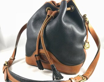 Dooney & Bourke Authentic Vintage Navy and Tan Pebble Leather Drawstring Bucket Shoulder Bag