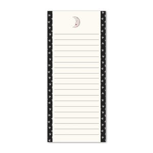 May include: A lined notepad with a cream-colored background. The top features a crescent moon with a smiling face. The sides are bordered with black and white stars. The notepad is designed for jotting down notes.