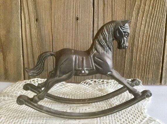 old metal rocking horse