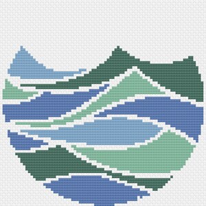 May include: Abstract cross-stitch pattern with a blue, green, and white color scheme. The pattern resembles a mountain range with overlapping peaks and valleys.
