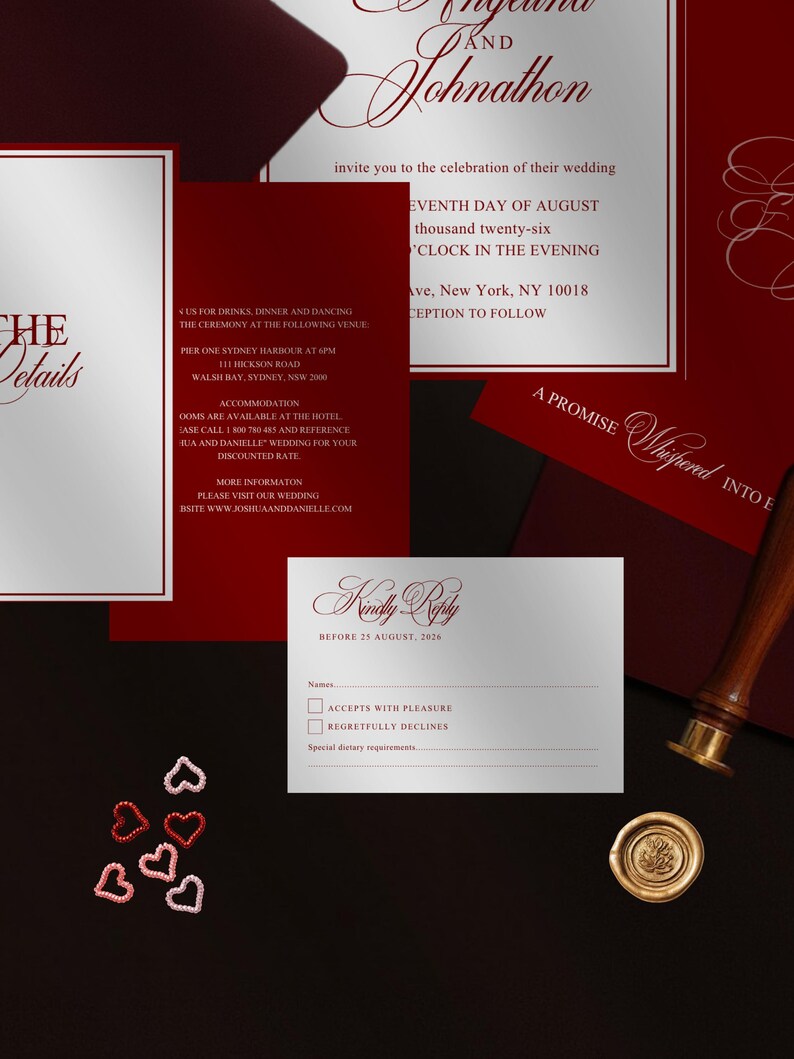 May include: Elegant wedding invitation suite in burgundy and silver. Includes invitation, RSVP card, and details card. Features ornate calligraphy and a wax seal. The text reads "Joshua and Danielle" and "Kindly Reply".