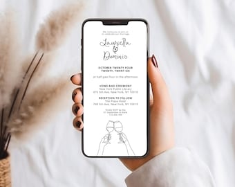 Puede incluir: Un teléfono inteligente muestra una invitación de boda para Lauriella & Dominic. La invitación incluye la fecha, hora, lugares de la ceremonia y recepción en Nueva York. El diseño presenta un dibujo lineal de dos copas de vino brindando.