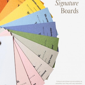 May include: A fan of colorful paper swatches, each labeled with a unique color name like "pumpkin" and "lavender." The text "Our Signature Boards" is displayed in elegant script. The color palette includes shades of orange, yellow, blue, green, and pink.