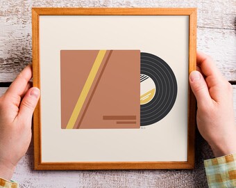 May include: A framed print of a minimalist illustration of a record and its cover. The cover is a brown rectangle with a yellow diagonal line. The record is black with a smaller yellow circle in the center.