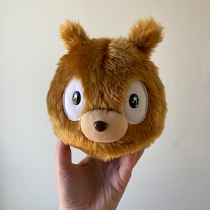 Honey brown Woff plushie from Hilda cartoon