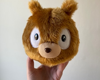 Honey brown Woff plushie from Hilda cartoon