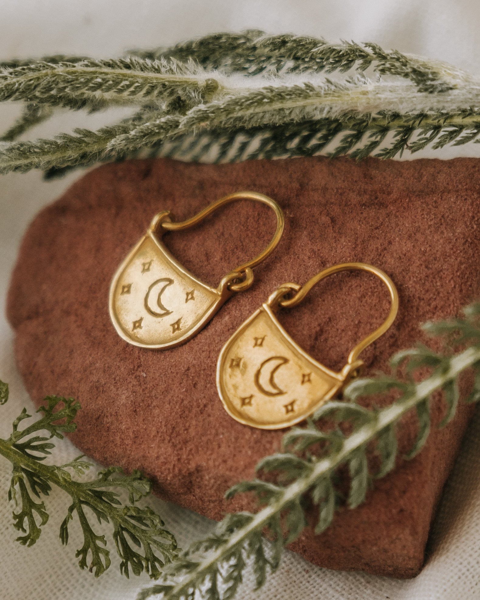Gold moon and star dangle earrings deals