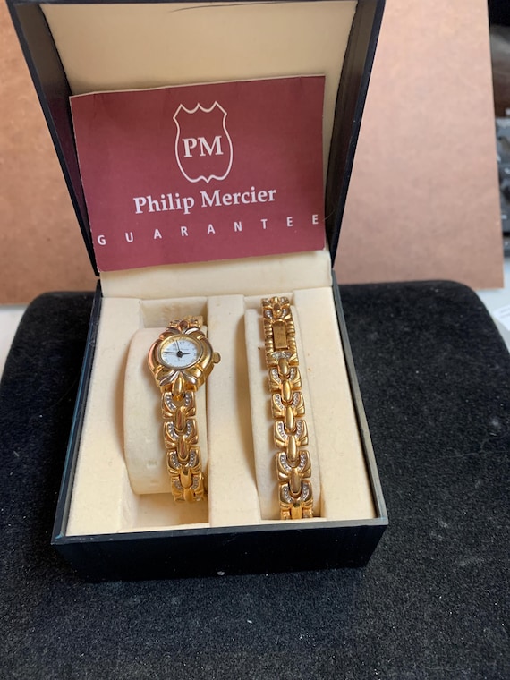 A Simple No Fuss Ladies Philip Mercier White Face Watch Gold Tone