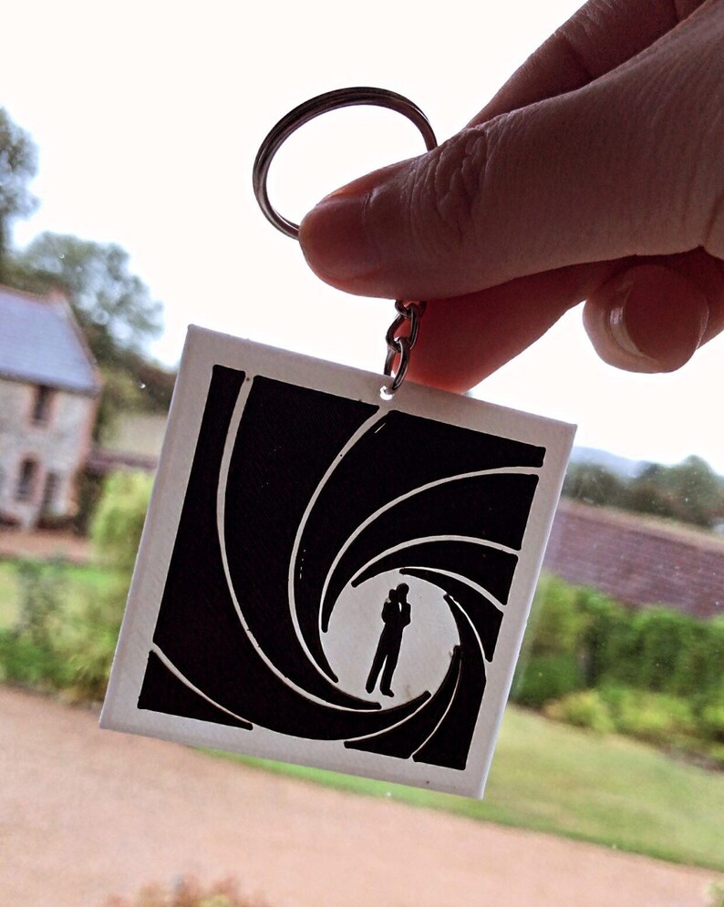 James Bond 007 title sequence inspired keychain / keyring. Etsy