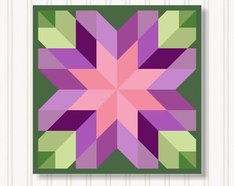 May include: A geometric quilt block featuring a stylized flower design. The flower is composed of pink, purple, and lavender shapes, set against a green background. The quilt block is square and has a symmetrical, star-like pattern.