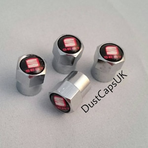 BLACK CHROME VALVE TYRE DUST WHEEL CAPS VAUXHALL ASTRA CONVERTIBLE