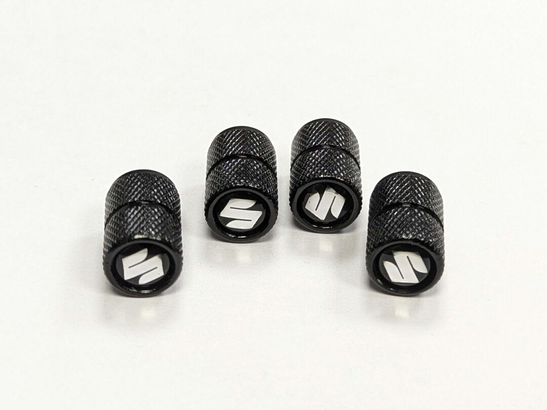 Black Badged Valve / Dust Caps – Set Of 4 – Compatible With Suzuki – Free Tracked Post