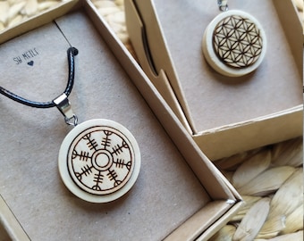 生命の花または保護シールドの島のシンボルが付いた木製のペンダント