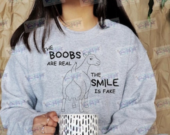 The boobs are real, the smile is fake goat tshirt