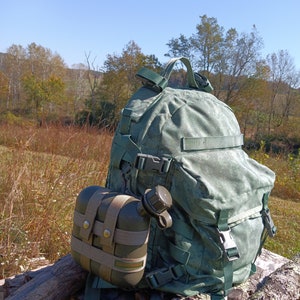2-Quart Canteen MOLLE Cage, hunting, hiking, bushcraft, tactical gear, military surplus, preppers, camping gear. 059