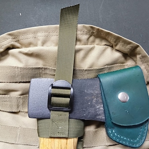 MOLLE Compatible Axe Carry Adapters. bushcraft , tactical gear, hiking, camping, outdoor activities, axe holder. 596