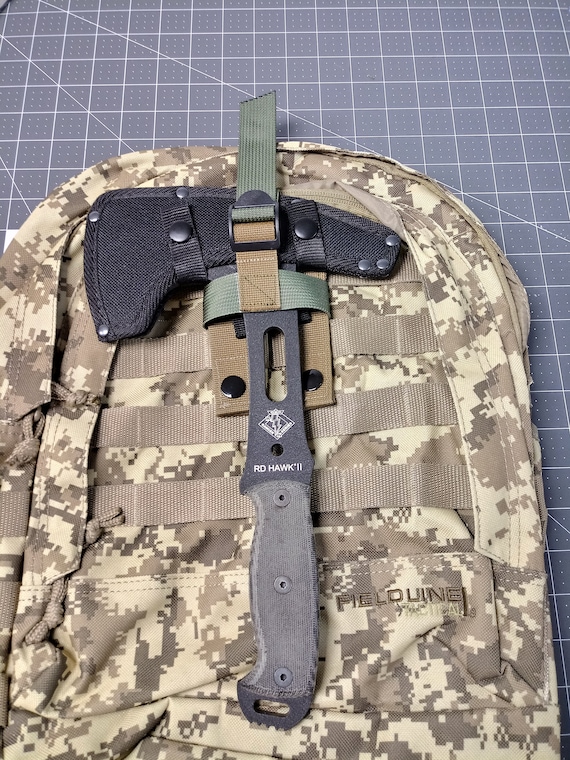 bushcraft backpack with axe holder
