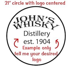 May include: A 21-inch round sign with a black and white logo that says "JOHN'S WHISKY Distillery est. 1904". The text "Example only tell me your desired logo" is in red.