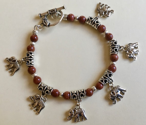 Bracciale Ametista E Ambra Con Chiusura In Argento Dorato