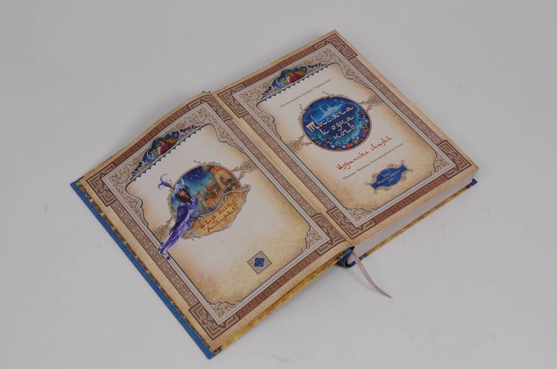 May include: A set of three ceramic nesting bowls in graduating sizes. The bowls are white with a blue floral pattern and a scalloped edge. The largest bowl is approximately 8 inches in diameter.