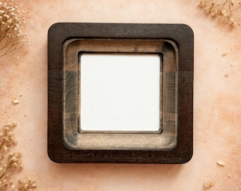 Quadratischer Fotorahmen aus Holz für die Wand