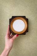 Original round wooden photo frame with a square base product logo
