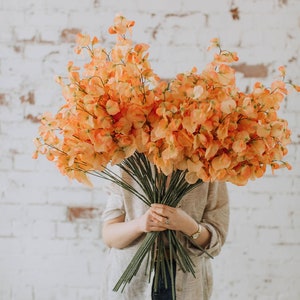 Artificial sweet pea stem spray in peach image 1