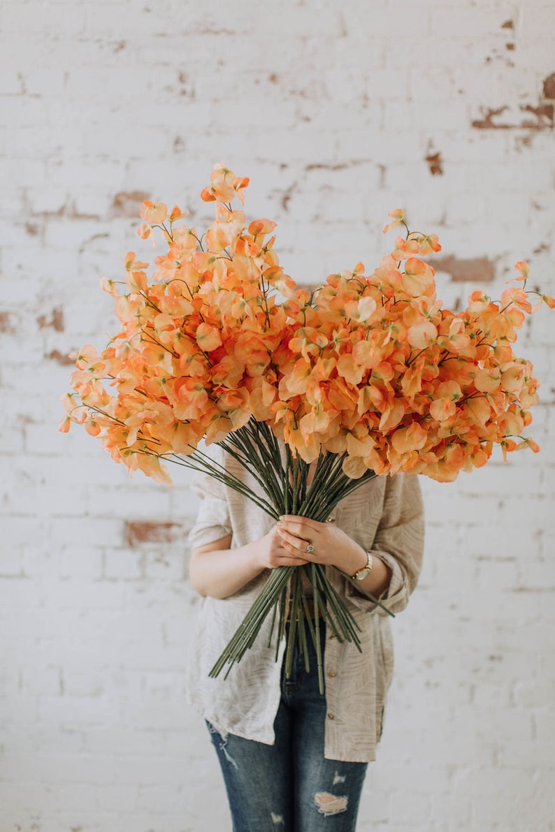 Artificial sweet pea stem spray in peach image 1