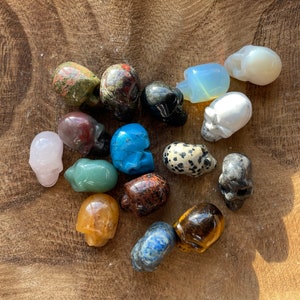 Crystal skulls! Various stones and crystal types Rose quartz opal lite sodalite Unakite Tigers eye obsidian aventurine Agate Jasper