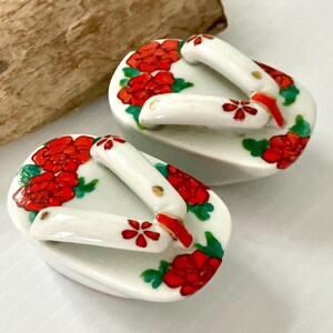 Vintage Japanese Geta Sandal Salt & Pepper Shakers - Hand Painted with/ Red Flowers -  Measures 2.5in Long. x 1 5/8in. Wide x 1.5in. Tall
