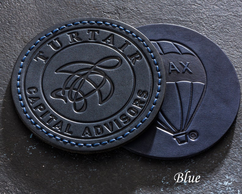 navy blue leather coasters company logo