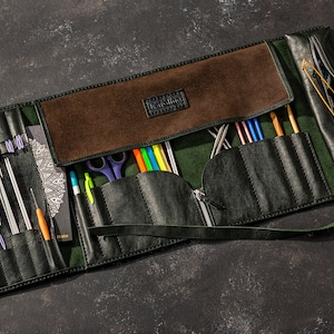 Open view of long leather craft roll for knitting and crochet accessories