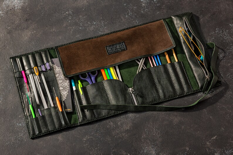 Open view of long leather craft roll for knitting and crochet accessories