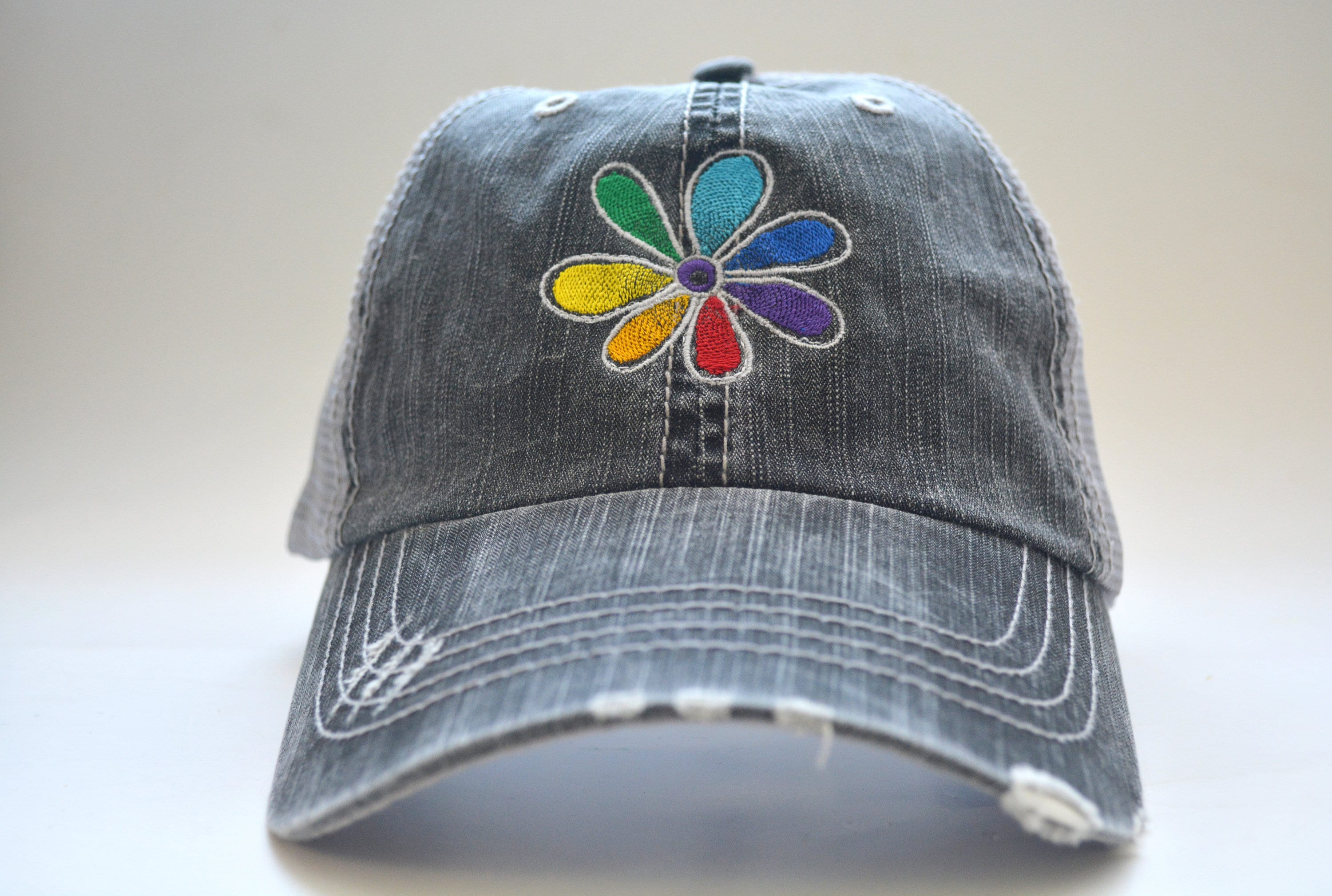 Rainbow Flower Embroidered Distressed Trucker Hat