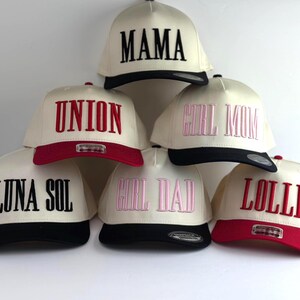 3d puff embroidery. custom text with 3d effect on 2 tone cotton snapback hats.