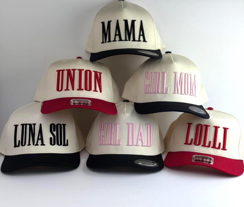 3d puff embroidery. custom text with 3d effect on 2 tone cotton snapback hats.