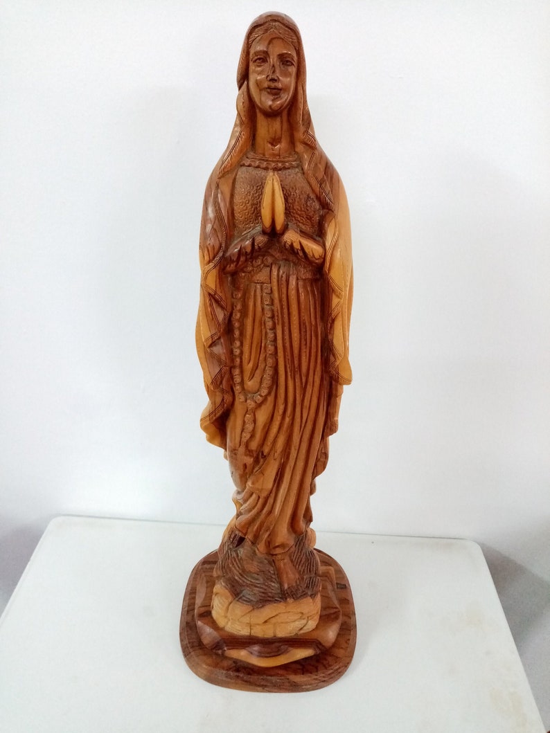 Praying Virgin Mary with rosary image 0