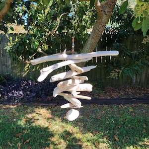 Driftwood mobile with shell and beads