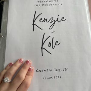 May include: A white wedding program with black text. The text reads "Welcome to the wedding of Kenzie + Kole, Columbia City, IN 03.29.2024".