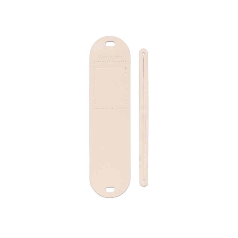 May include: A light beige leather strap with a small rectangular pocket and a loop at the top. The strap is attached to a long, thin, light beige leather strap.
