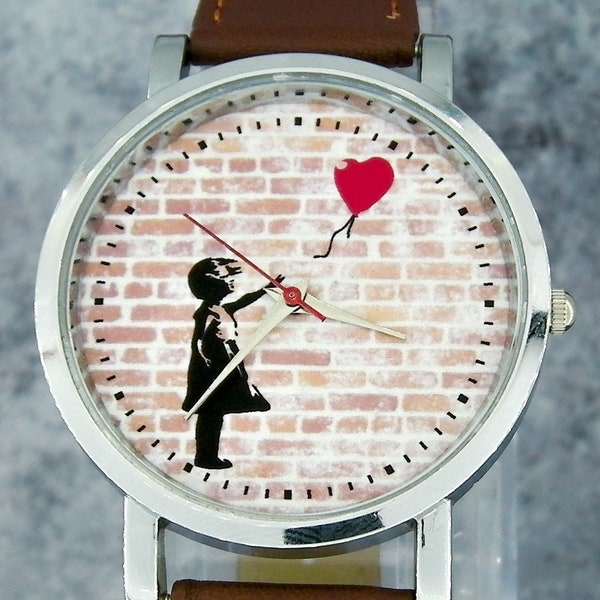 Girl with Balloon Banksy wristwatch. Minimalist/understated design. Choice of brown/black strap. Unique watch design