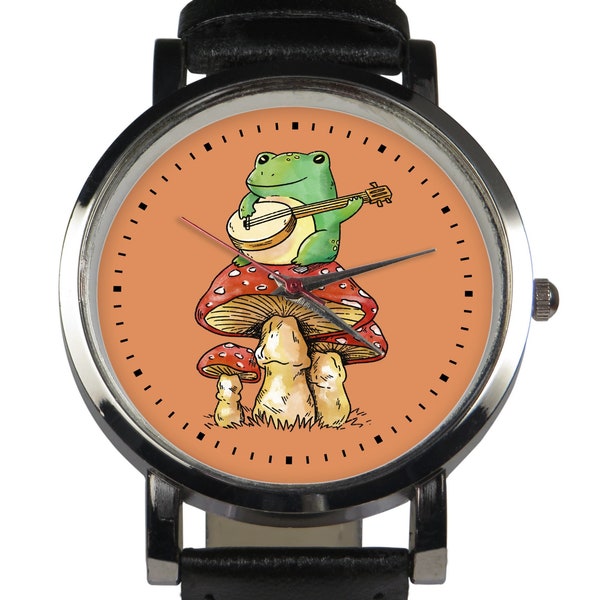 Cute frog playing banjo wristwatch, choice of black/brown leather strap.  Unique hand-drawn design. Silver stainless steel case. Handmade
