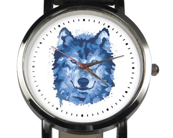 Conception de montre-bracelet loup solitaire à l’aquarelle. Montre colorée unique avec un design de loup à thème bleu; des yeux frappants. Cadeau pour tous ceux qui aiment les animaux