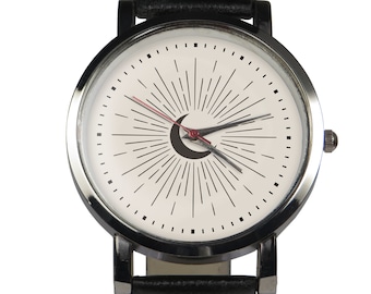 Crescent moon ray design wristwatch. Black or brown strap