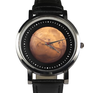 Conception de montre-bracelet Mars &#39;The red planet&#39;. Bracelet noir ou marron
