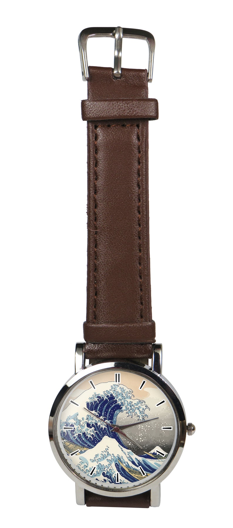 May include: A silver wristwatch with a brown leather band. The watch face features a colorful image of "The Great Wave off Kanagawa" by Katsushika Hokusai.