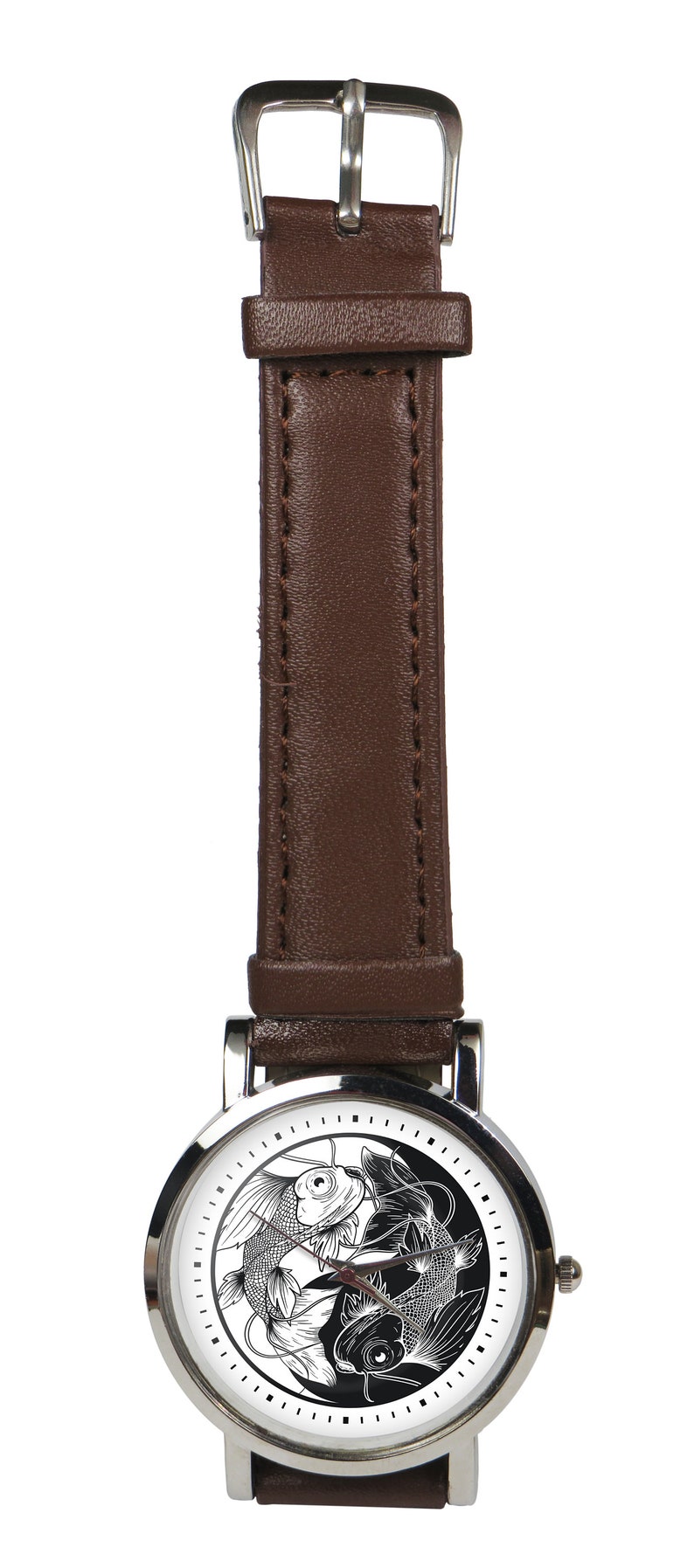 May include: A silver wristwatch with a brown leather band. The watch face features a white background with a black and white yin yang symbol with two fish inside.